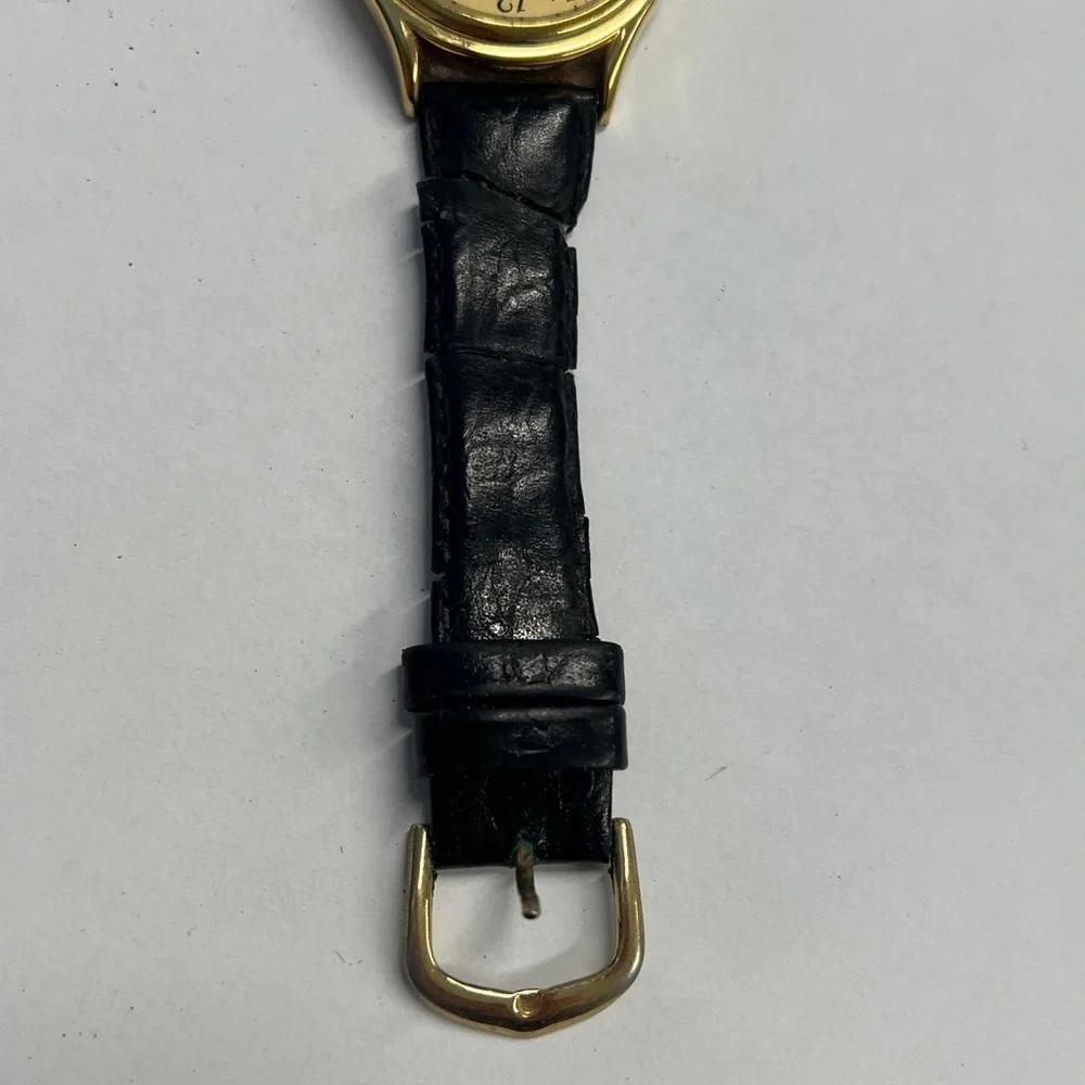 Caravelle by Bulova Vintage Quarts Watch Day Date Second Hand Function